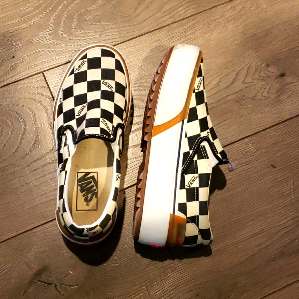 Vans platforms slip-ons, black and white. Size 6.5 women's, 5 mens.